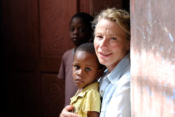Volunteer working with children